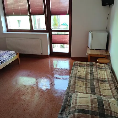 Δωμάτια σε οικογενειακή κατοικία Goscinne